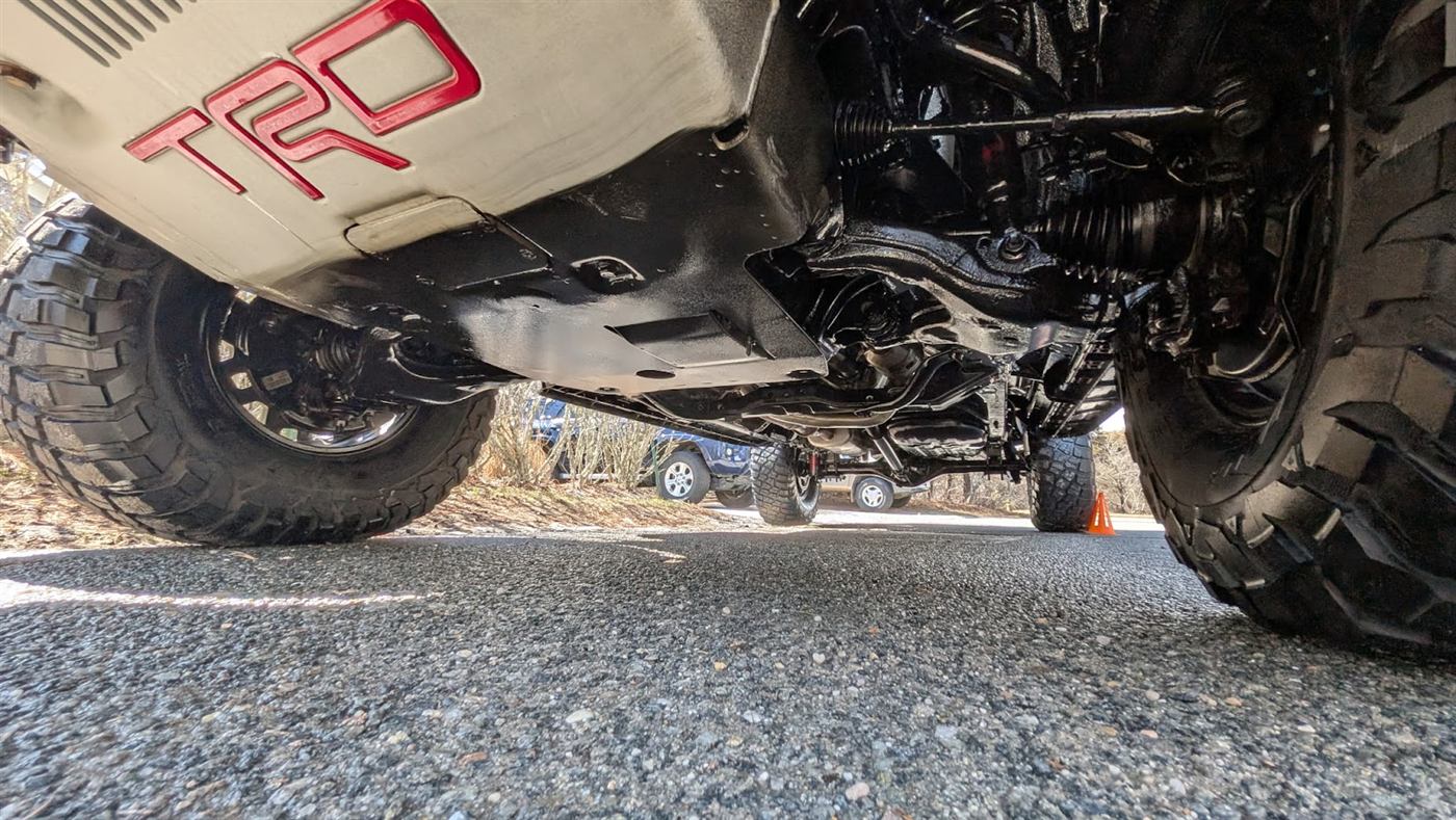 Customer photo — spotless undercarriage on a TRD Toyota